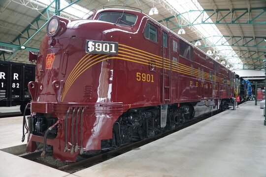 Strasburg, Pennsylvania, U.S - March 26, 2022 - The red Pennsylvania 5901 diesel locomotive train inside of the Railroad Museum