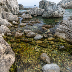 Fototapeta na wymiar Sea rocky bottom with a lot of boulders
