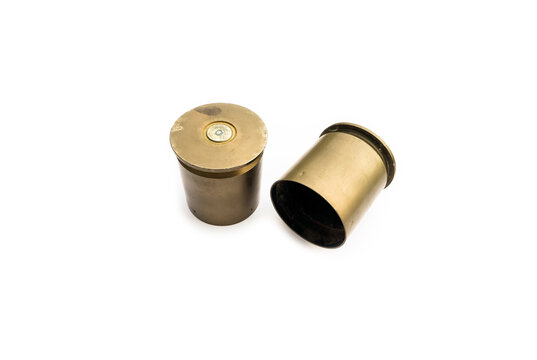 isolated used and old m203 bullet shells on white background, soft and selective focus.