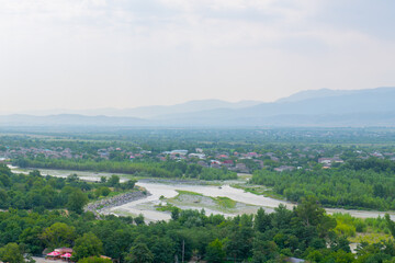 Fototapeta na wymiar nature of georgia in summer with a wide river