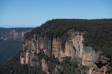 Fototapeta na wymiar Views from Govetts Leap lookout, Blackheath, Blue Mountains, New South Wales, Australia, including sandstone escarpments, sheer cliff walls, the deep canyons of the Grose Valley