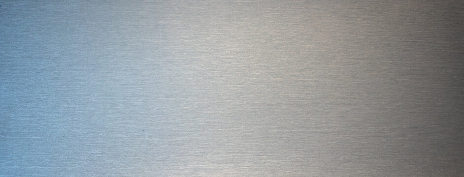 Rectangular photo of the chrome metal texture. Silver background for text. Stainless steel background.