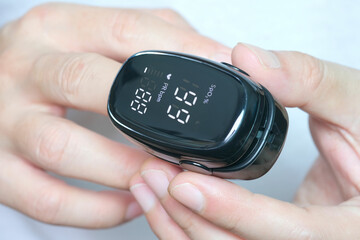 A device to measure the oxygen saturation of a person at the fingertips. And checking oxygen depletion is an emergency sign of pneumonia caused 