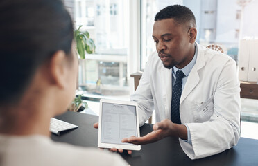 This is just a formality. Shot of a young male doctor talking to a patient about a survey in an office.