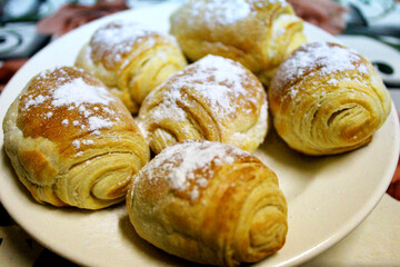 sweet bun, muffin on a plate cooked at home 