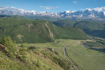 Naklejka premium mountains river road forest sky summer
