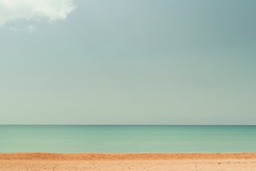 Beach blue ocean and sky background, summer concept . Blurred image of sea and blue sky background with clouds. Nature back, idea banner for holiday or weekend