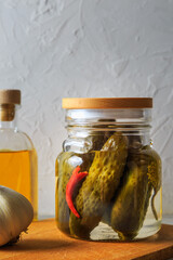 Pickled cucumbers in a jar.