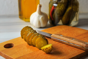 Pickled cucumbers in a jar.