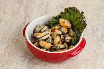 Tasty marinated mussels in the bowl