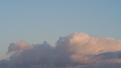 Clouds with evening sun background