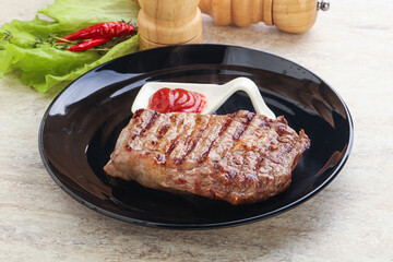 Grilled rib-eye steak beef meat