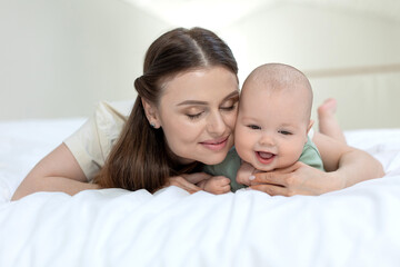 Obraz na płótnie Canvas A woman with a small child. Mom with a baby. High quality photo