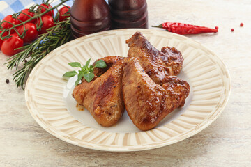 Roasted chicken wings with spicy sauce