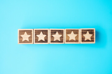 star symbol block on blue background. Service rating, ranking, customer review, satisfaction, evaluation and feedback concept
