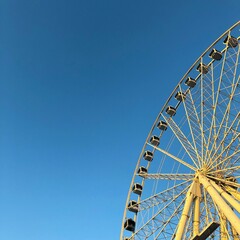 ferris wheel on a blue sky