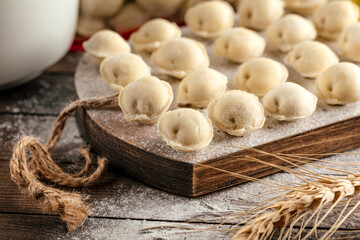 Closeup on semi-finished meat filled russian dumplings