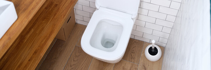 Toilet after renovation, new plumbing, top view