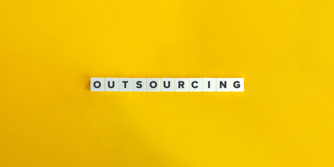 Outsourcing Word and Banner. Letter Tiles on Yellow Background. Minimal Aesthetics.