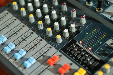 Close up shot of mixing audio device shot from high angle
