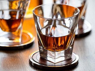 Three glasses of neat whisky