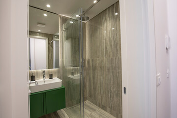 Interior of a bathroom interior with shower cabin