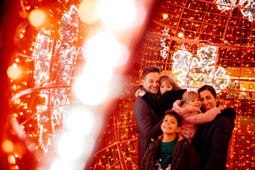 Happy family spending time together on Christmas night