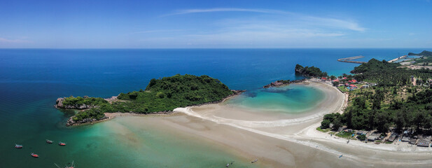 Tombolo a bar of sand or shingle joining an island to the mainland Aerial Shot Of A Sandbank On A Beautiful Summer Day