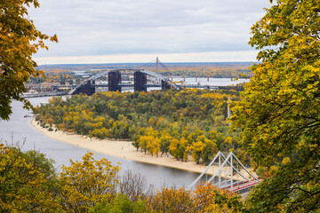 Aerial view of pedestrian suspended bridge across the rive Dnipro in Kiev, Ukraine