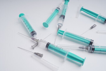 medical disposable injection syringe on a white background