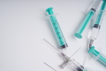 medical disposable injection syringe on a white background