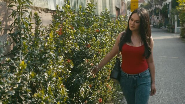 a beautiful trans woman looks at camera