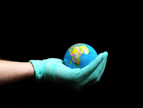 Planet Earth and a Hand