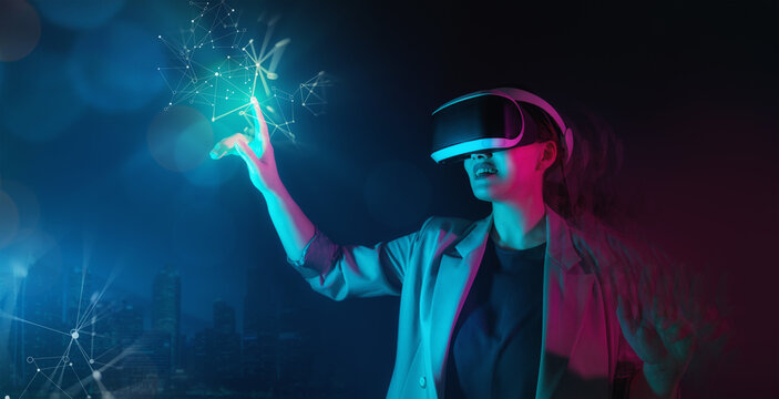 Woman with VR virtual reality goggles