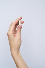 woman hand hold drag or medicine on white background