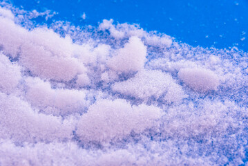 Snow on a blue background.