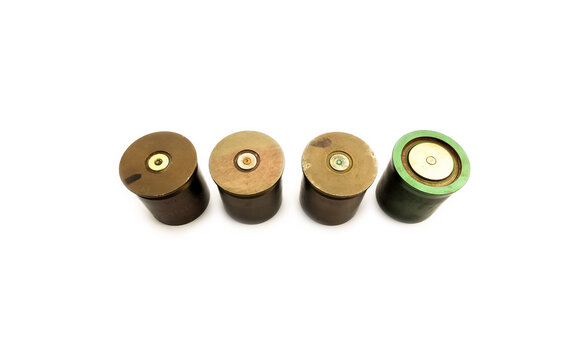 isolated used and old m203 bullet shells on white background, soft and selective focus.