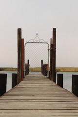 wooden bridge over the sea