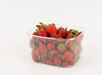 strawberries in bowl on white background