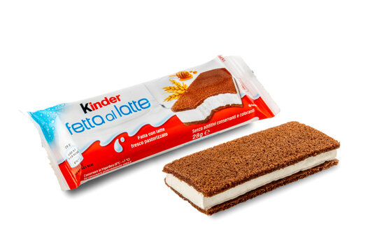 Alba, Italy - March 28, 2022: package of Kinder fetta al latte Ferrero, snack sponge cake filled with creamy milk and honey,  produced by Ferrero important confectionery factory in the world