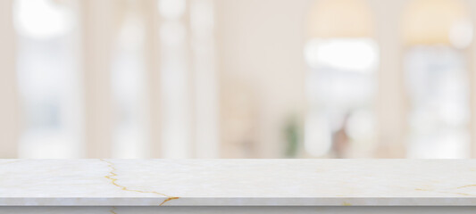 Obraz na płótnie Canvas marble table top with blurred kitchen cafe restaurant interior background