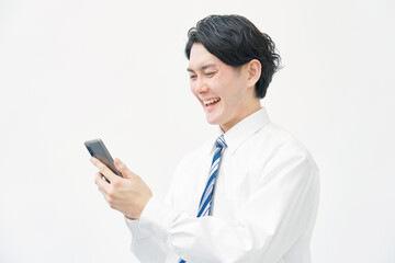 ビジネスマン　スマホ持ち　白背景