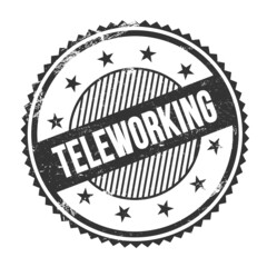 TELEWORKING text written on black grungy round stamp.