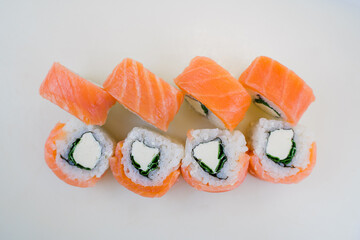 roll with salmon and white rice and cream cheese