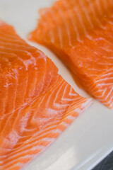 large pieces of fresh salmon on the table