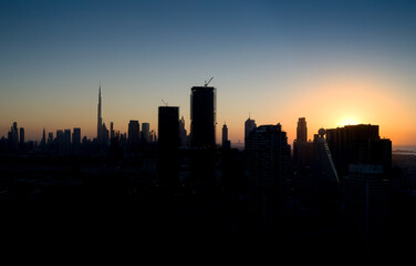 Dubai skyline from top of dubai frame at sunset.