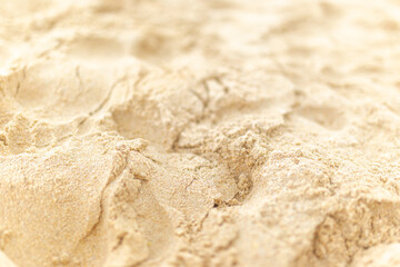 Fototapeta na wymiar Sand Texture. Brown sand. Background from fine sand. Close-up image