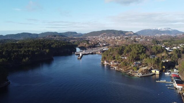 Bay of Halhjem with E39 ferry pier - Sunny day beautiful aerial approach