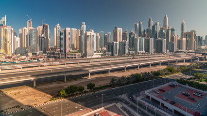 Naklejka na ściany i meble Dubai marina tallest block of skyscrapers all day timelapse.