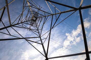 high voltage tower at sunset